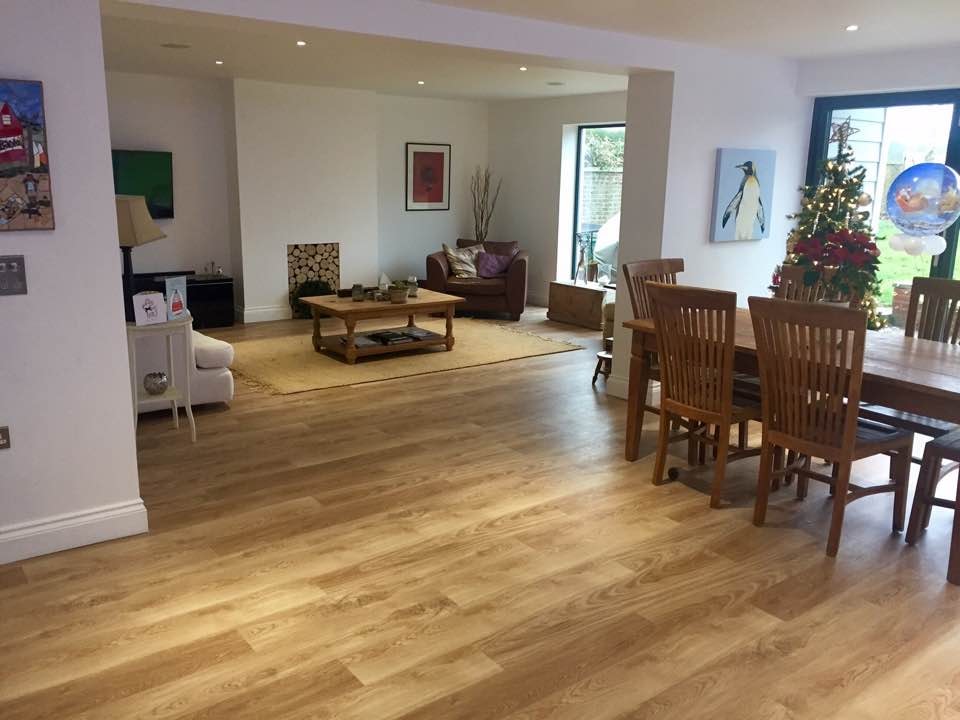 Completed extension — open-plan living and dining space with oak flooring