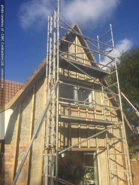 Extension under construction — scaffolding and stonework, Suffolk