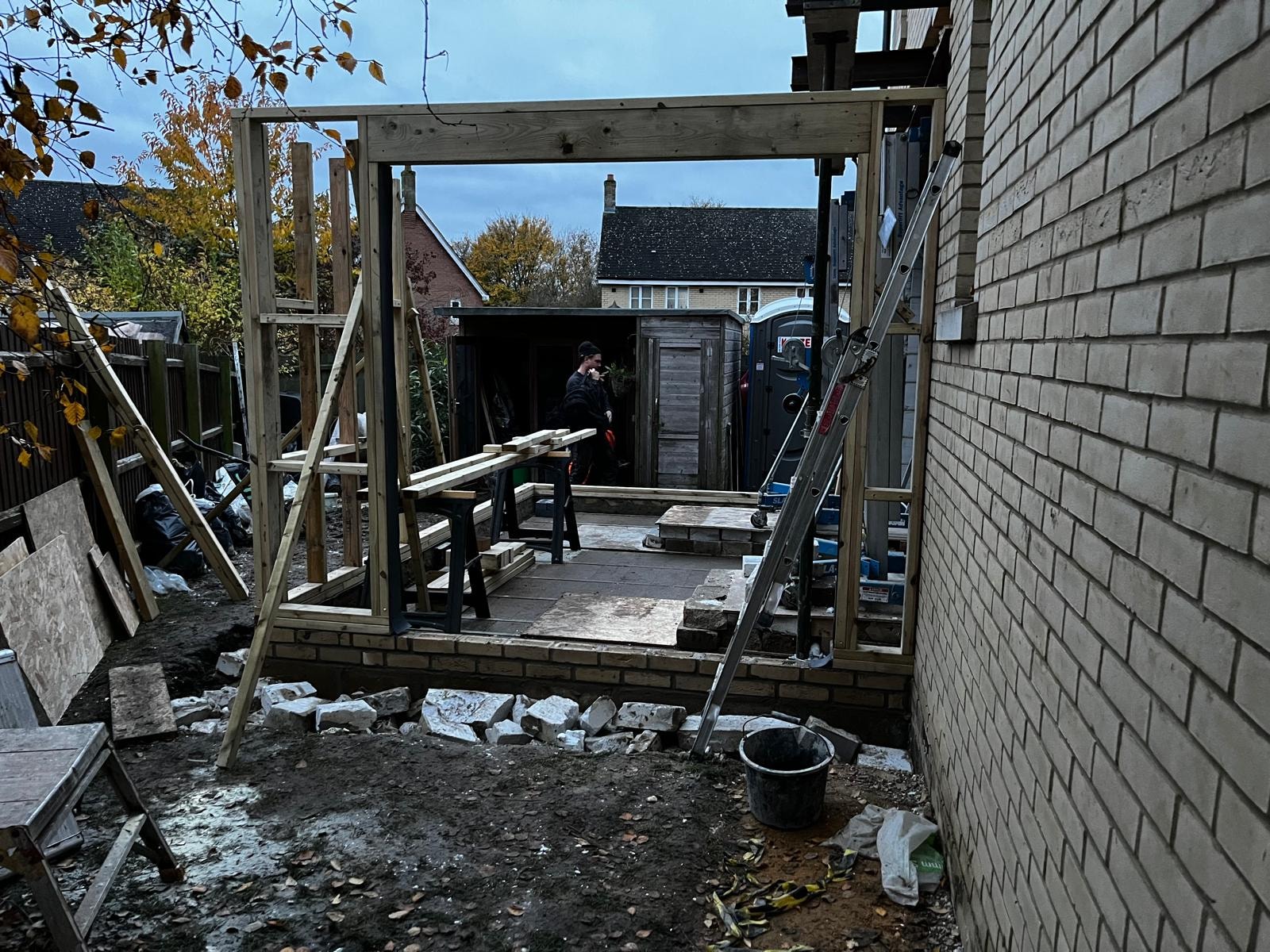 Extension in progress — timber frame structure taking shape
